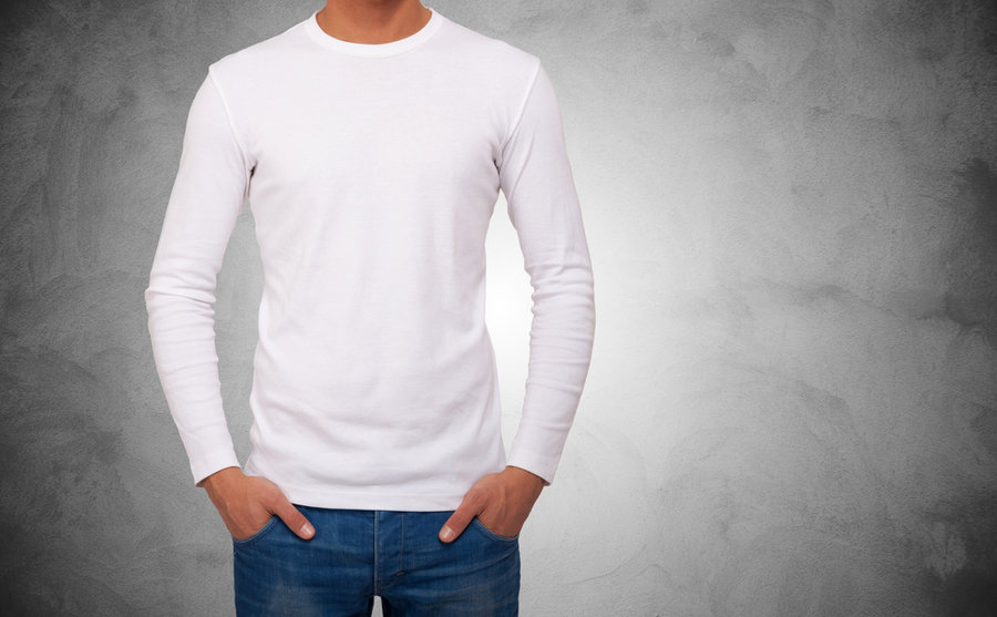 Closeup Of A Man Wearing A White T-Shirt With Long Sleeves