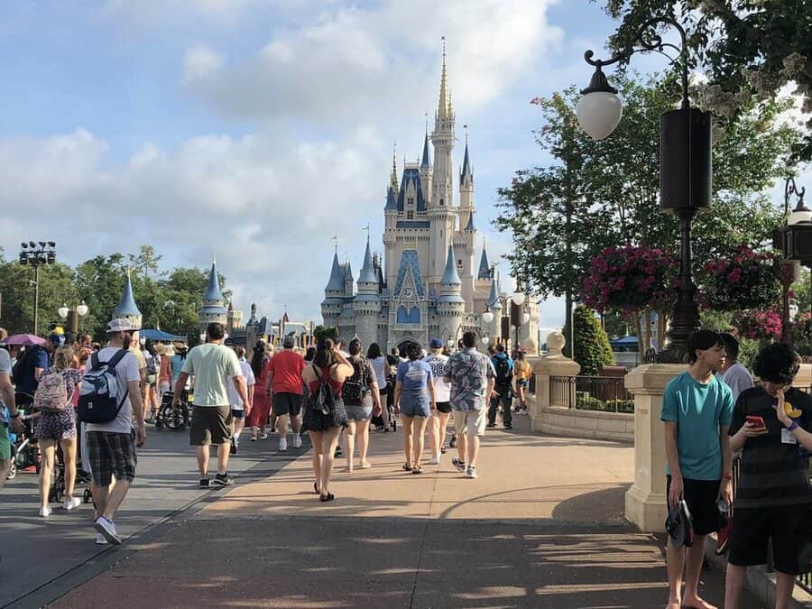 People Walking At The Magic Kingdom Disney World