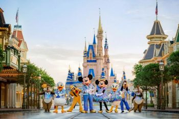 Walt Disney Castle Behind Mickey And Friends