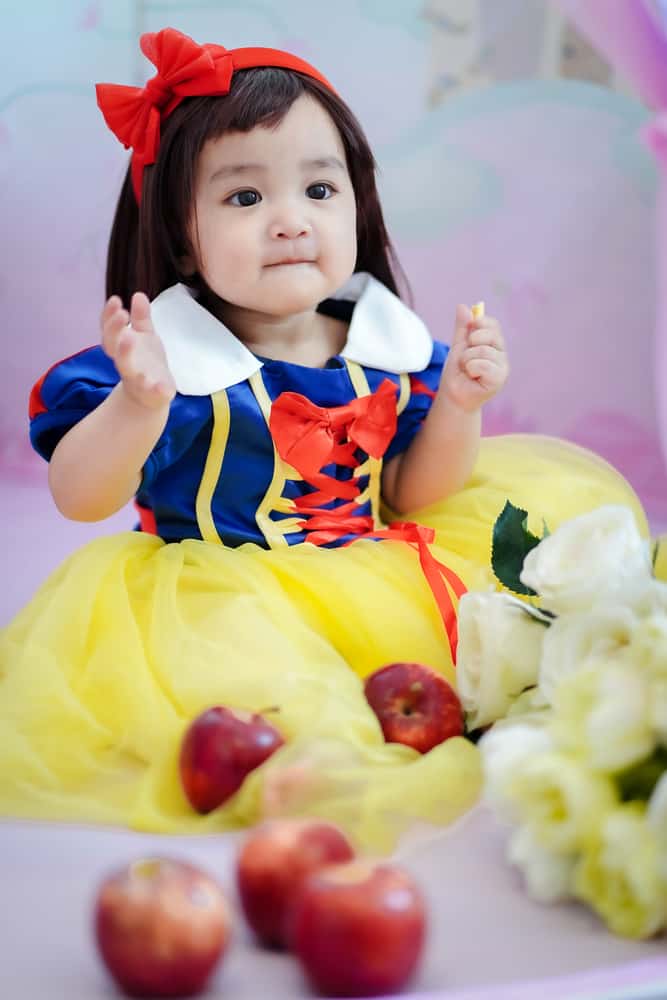 A Child In Snow White Costume