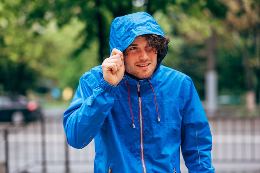 Man Wearing A Rain Jacket