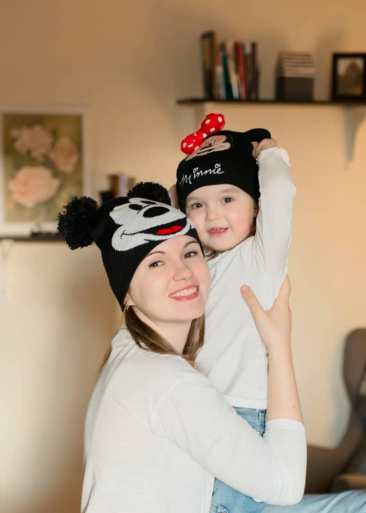 Mother And Daughter Wearing Mickey Hats