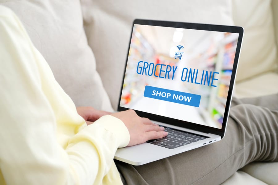 Woman Planning To Buy Grocery Items Online