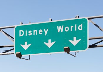 A Sign In Orlando, Fl Points To The Walt Disney World Resort On December 22, 2011. With More Than 47 Million Visitors In 2010, It Is World'S Most Visited