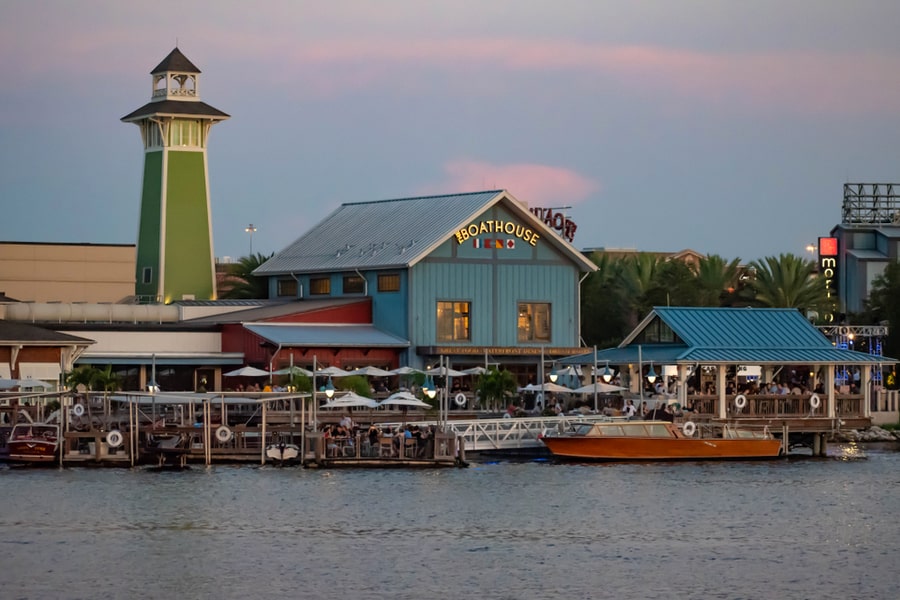 Colorful Dockside And Lighthouse On Sunset