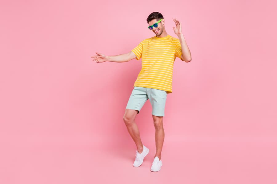 Full Body Photo Of Cheerful Young Happy Man Dance Wear Sunglass Vacation Summer Isolated On Pink Color Background