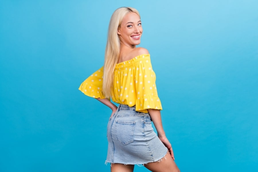Profile Photo Of Sweet Young Blong Lady Wear Dotted Top Skirt Isolated On Blue Color Background