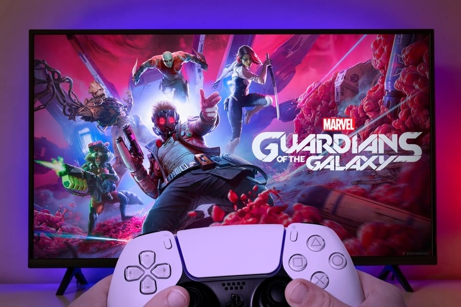 Boy Playing Guardians Of The Galaxy On Playstation