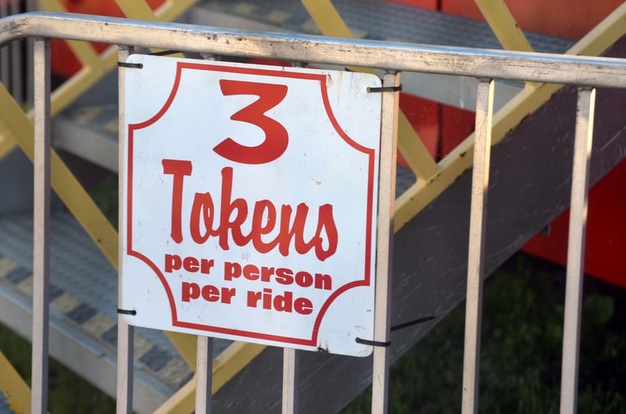 Tokens Required Sign At Amusement Park Carnival Ride